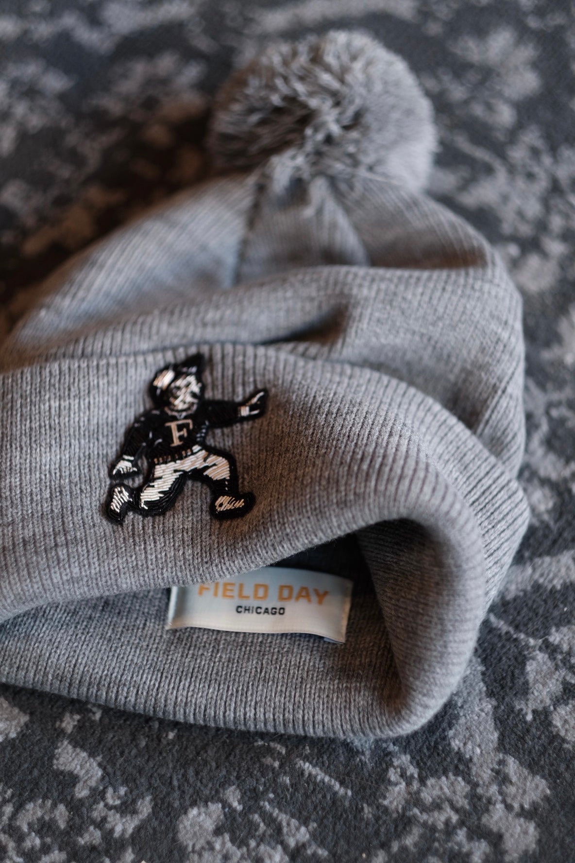 Run Boy Bullion Pom Cuff Beanie