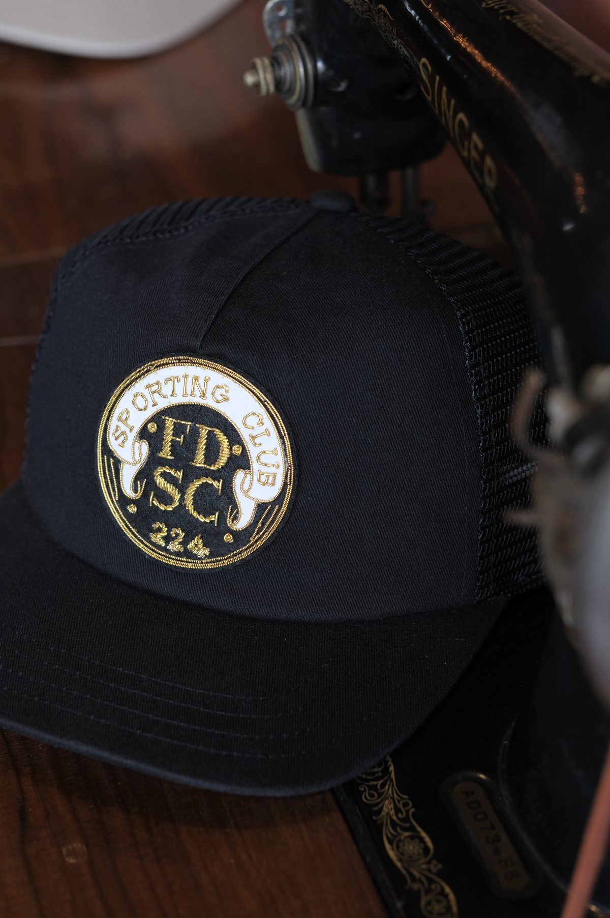 Sporting Club Bullion Trucker Hat