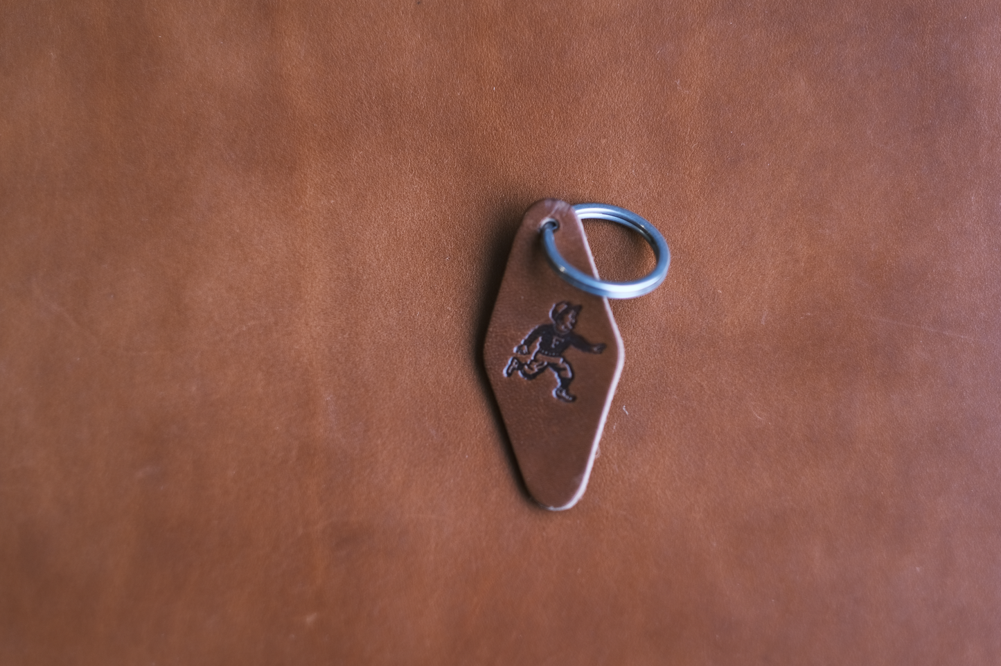 Run Boy Hotel Key Chain - Brown