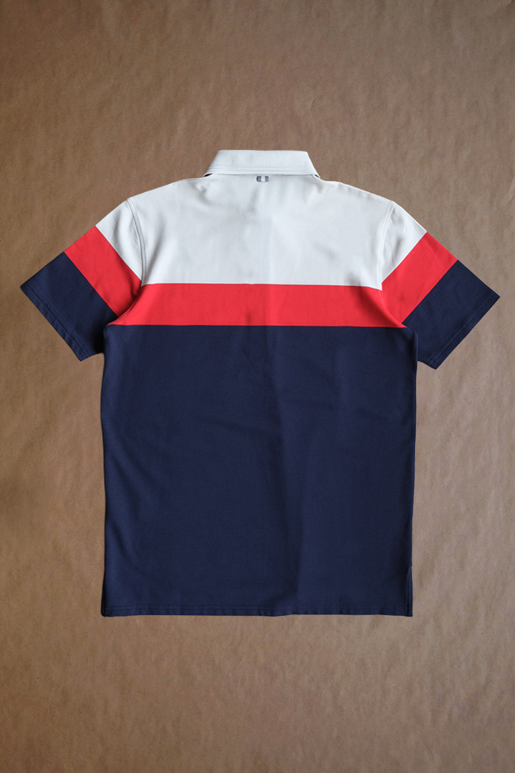 The Dunne Performance Polo - Fawn / Navy Heritage Colorblock