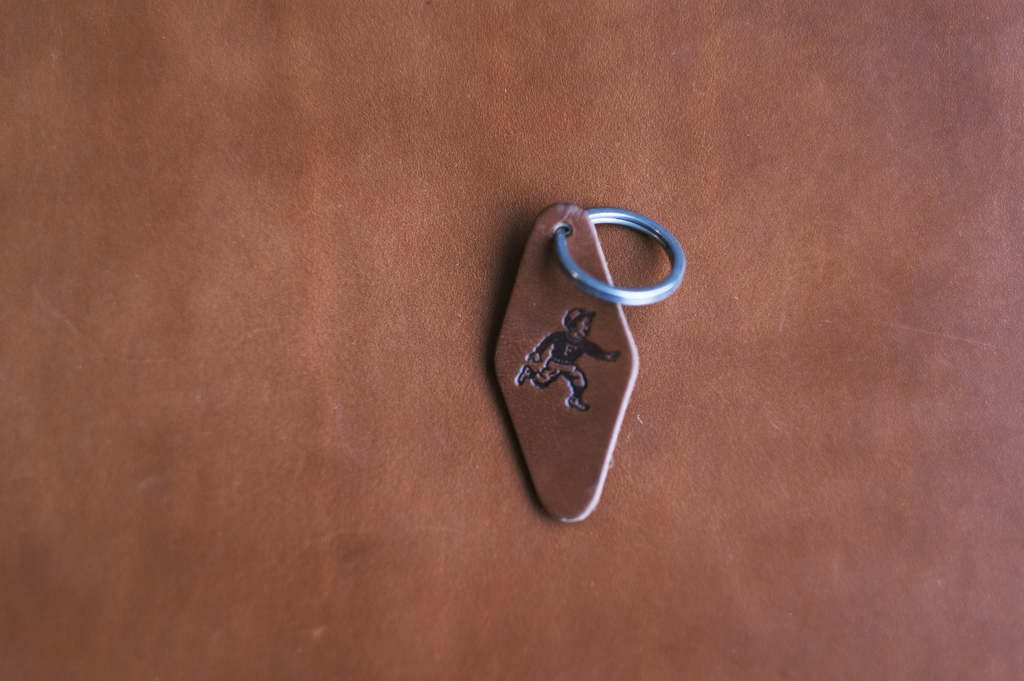 Run Boy Hotel Key Chain - Brown